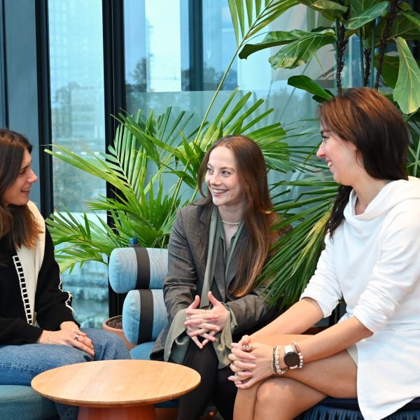 Female employees are chatting in the office